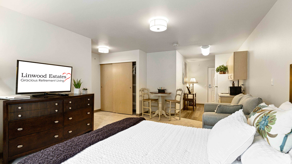 A furnished bedroom in a Linwood Estates apartment