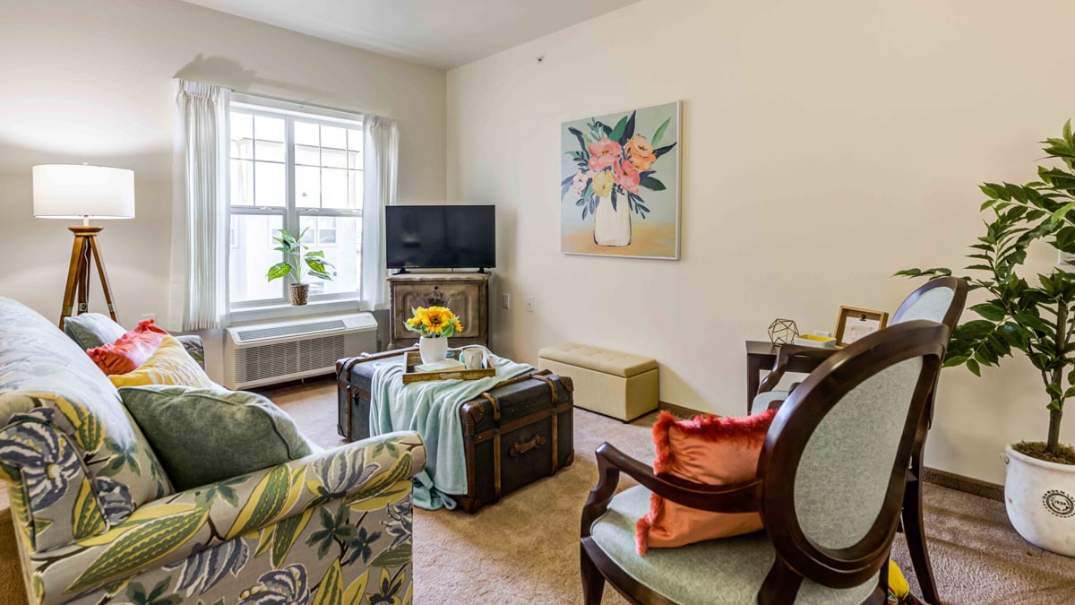 A living room in a Linwood Estates apartment