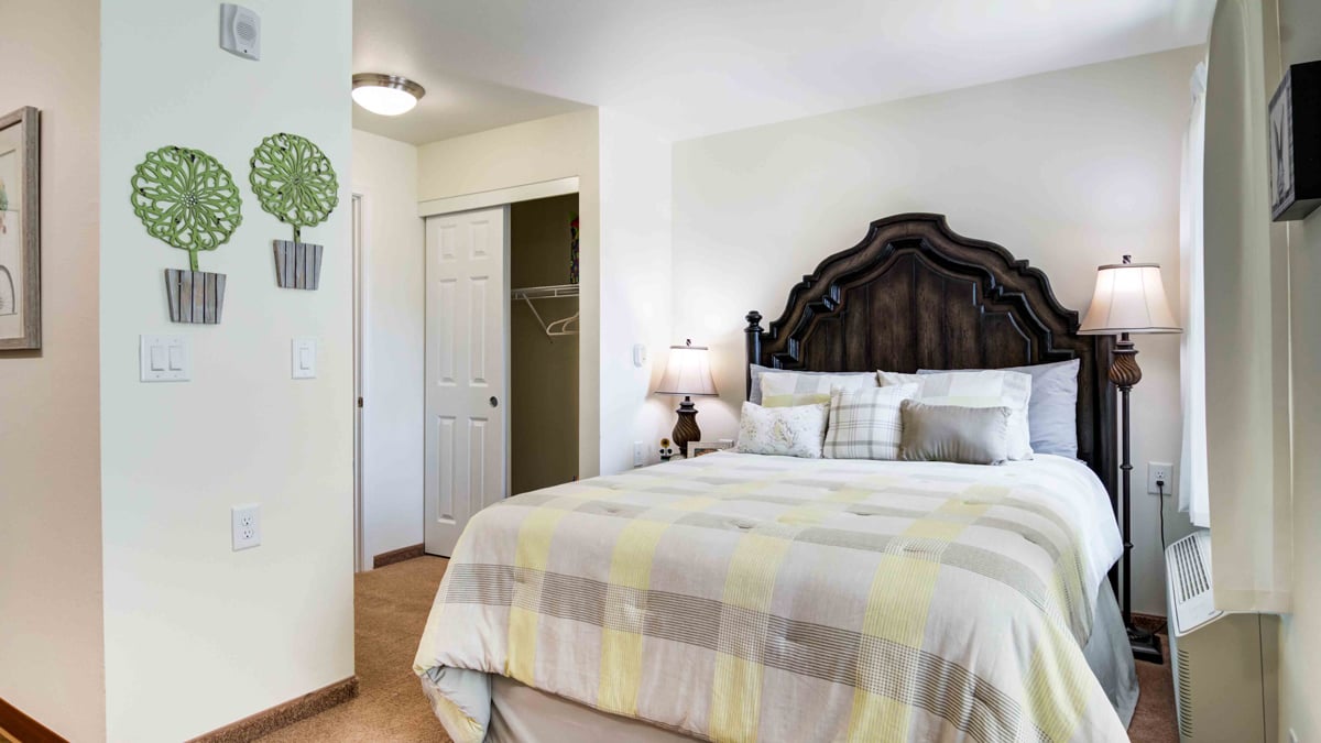 A furnished bedroom in a Linwood Estates apartment